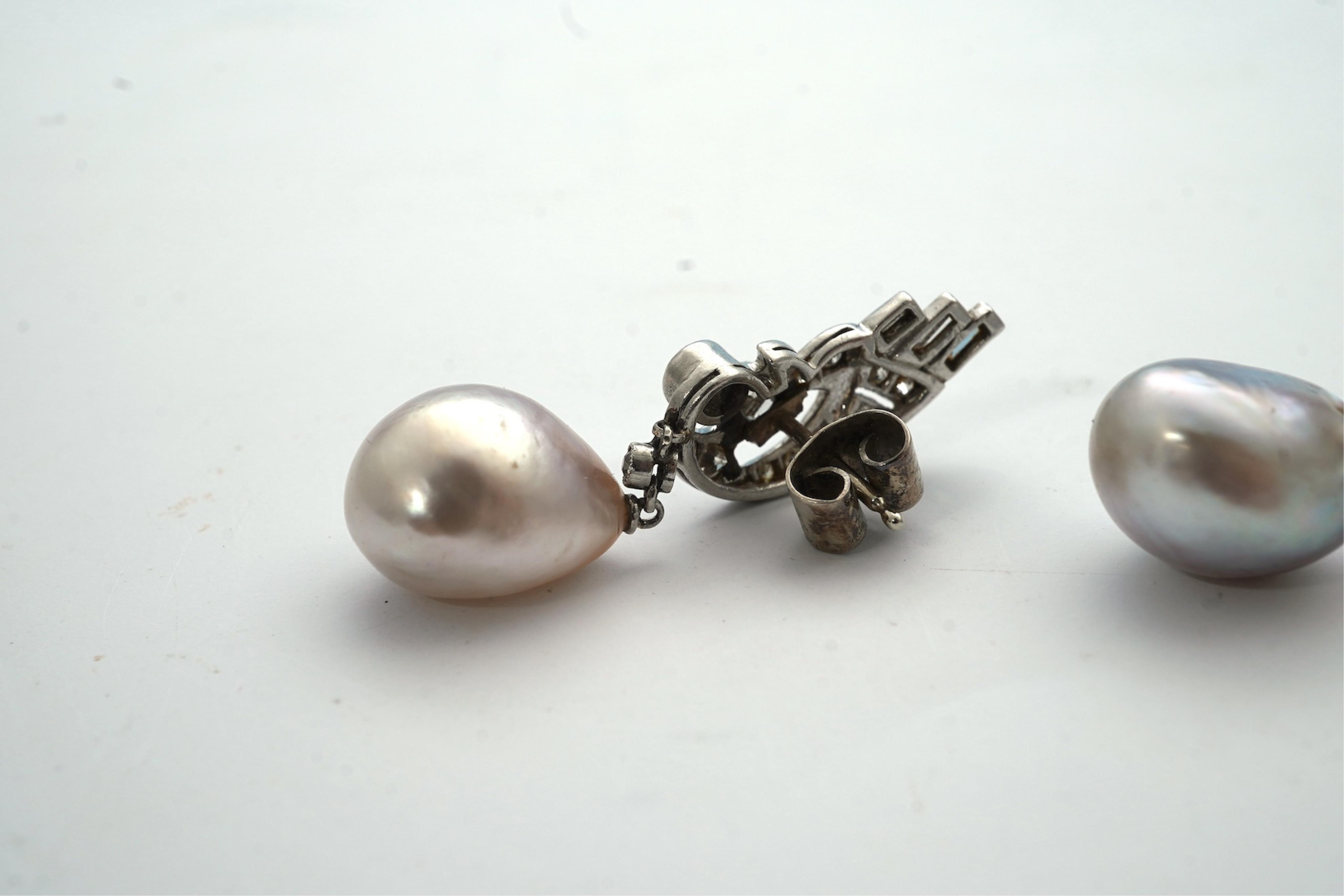 A fine pair of Art Deco natural pearl and diamond earrings, 1930s
